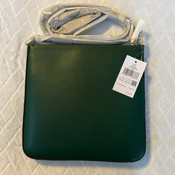 Green Kate Spade purse, brand new with tags and packaging, small blemish. - Picture 4 of 6